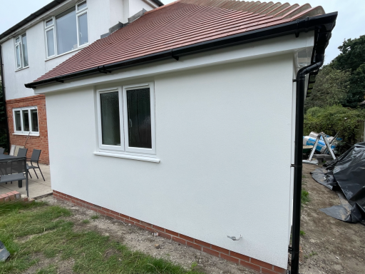 Completed garage extension project in Poole with modern exterior finish
