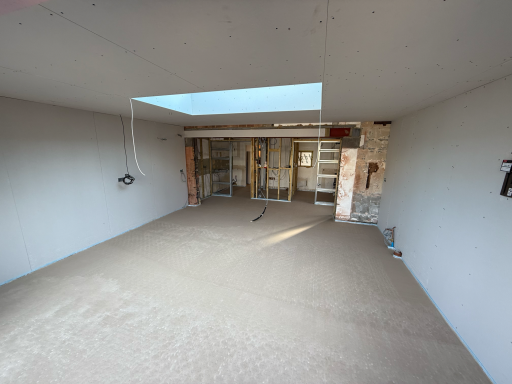 Kitchen extension in Poole featuring large doors and contemporary finish