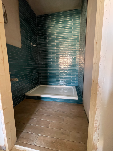 Stylish shower enclosure installed in a Poole bathroom with black fittings