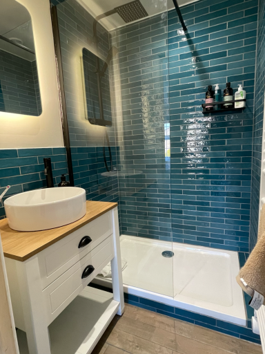 Modern shower room installation in Poole with walk-in shower and tiled walls