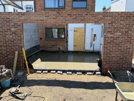 Spacious kitchen extension in Poole with clean lines and modern layout