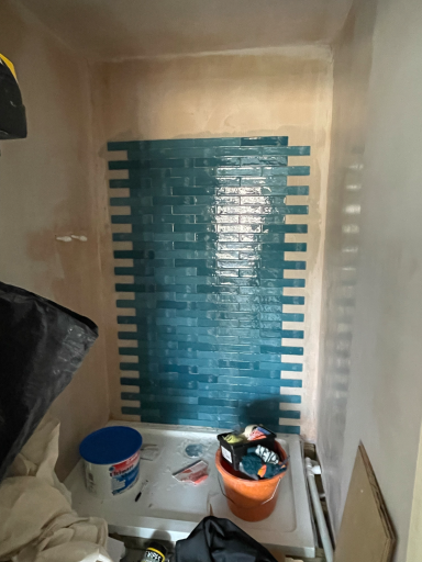 Fully refurbished shower room in Poole with sleek tiling and modern finish